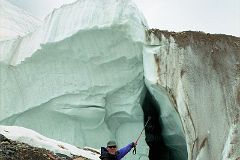 22 Jerome Ryan Points At True Glacier Below The Rubble On The Upper Baltoro Glacier